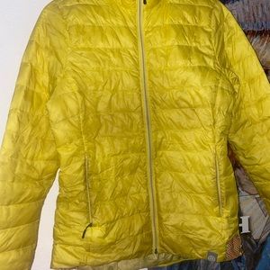 REI yellow puffy coat